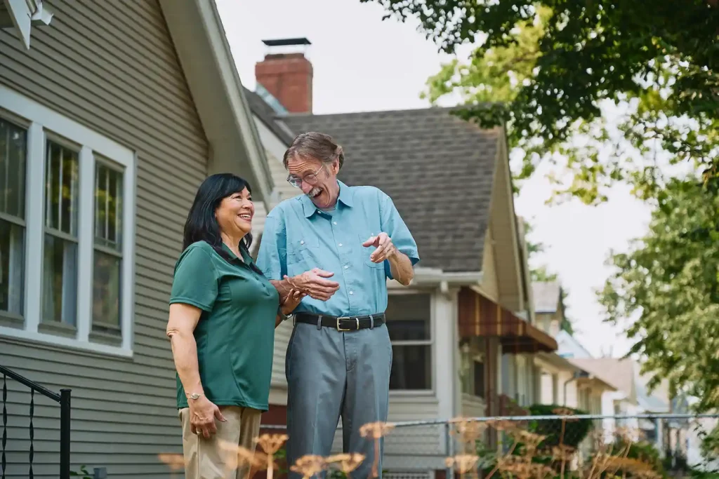 Care Pro and senior enjoying outdoor walk and conversation to combat depression in Toronto